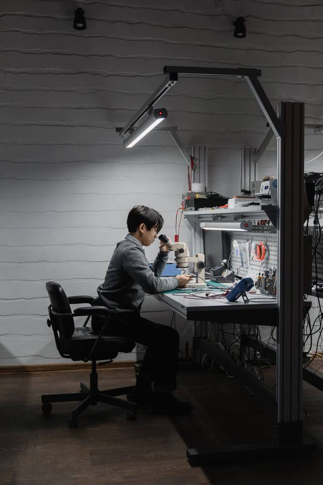 Engineer working at a technical workstation