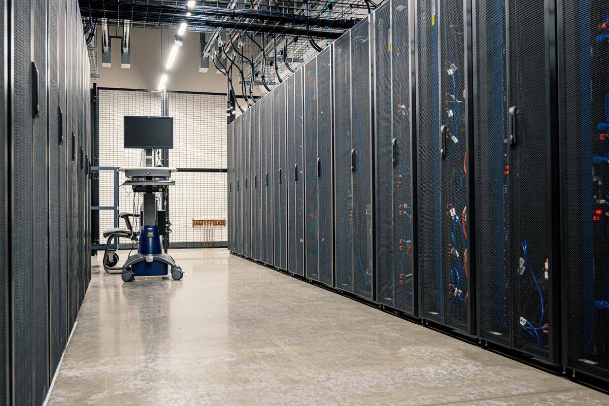 Aisle between server racks in a data centre