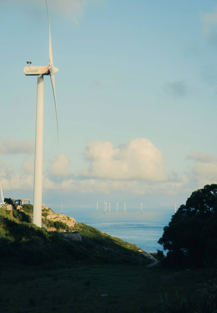 Wind turbines on a coastal hill